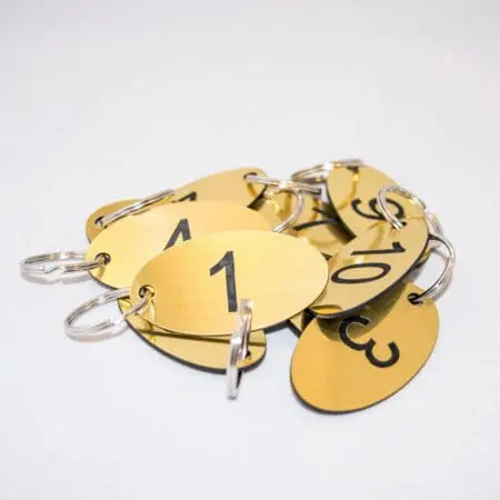 Alternative view of 1 to 15 oval shaped tags with 1 hole numbered key tags ideal for clubs, leisure centres, school