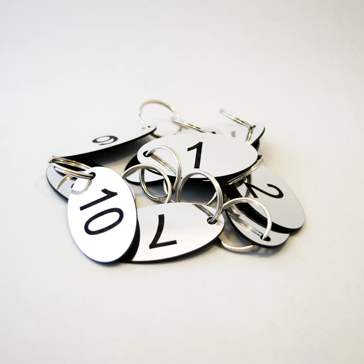 Set of 15 oval shaped numbered key tags ideal for clubs, leisure centres, school